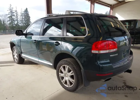 2005 Volkswagen Touareg V8 z USA, uszkodzony, nr VIN WVGMM77L65D008503